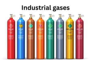 Colorful industrial gas cylinders aligned in a row